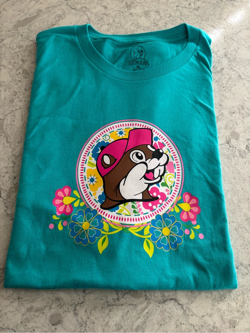 Buc-ee’s Teal Tee with Colorful Floral Motif